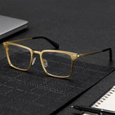 Gold Metal Frame Glasses With a Rectangle Shape